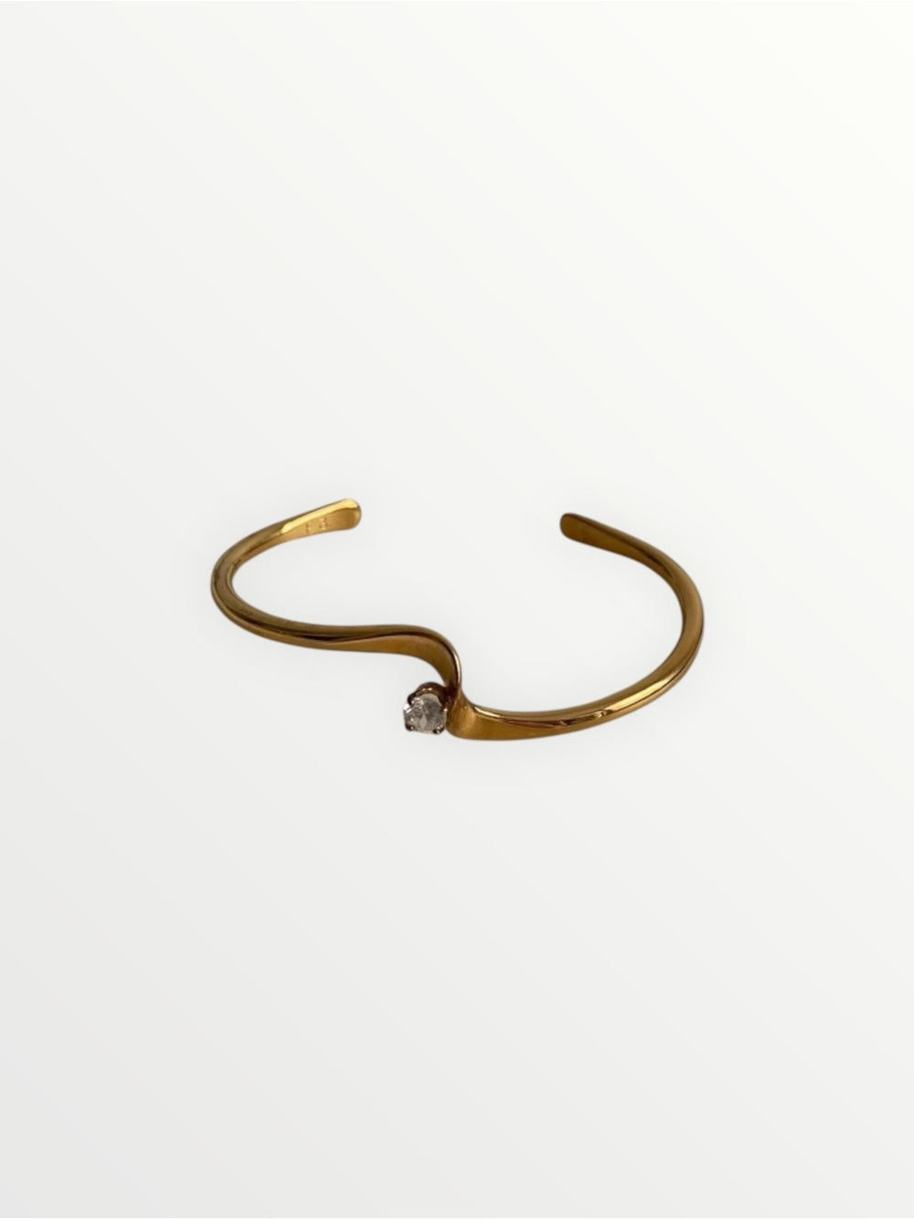Gold Open Cuff Wave Bracelet with Clear Stone Accent